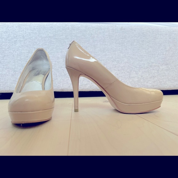 Michael Kors shoes (heels) too small for me.